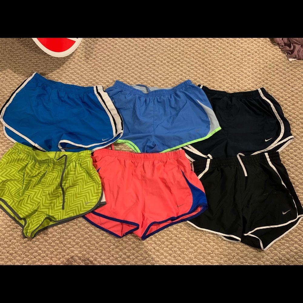 Lot of 6 pair Nike shorts and 1 Adidas tank top